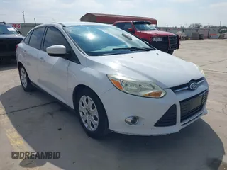 2012 Ford Focus SE с VIN 1FAHP3F23CL355097, выставлен на аукционе IAAI как лот 41478258 с пробегом 153 810 миль миль и . История ставок и продаж доступна на DreamBid. Изображение 1.