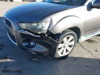 2011 Mitsubishi Outlander SE with VIN JA4AS3AW2BU034241, listed as a IAAI auction lot 41458396 with 100,024 mi miles. Bid and sale history available at carsss.com. Image 6.