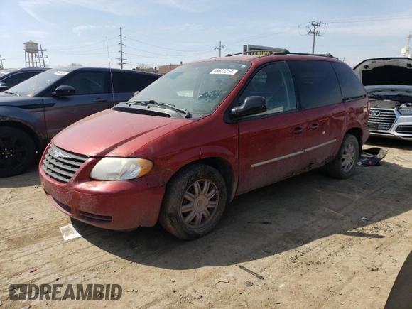 2006 Chrysler Town & Country with VIN 1A8GP45R86B569970, listed as a Copart auction lot 79897024 with 147,895 mi miles and Salvage Title. Bid and sale history available at DreamBid. Image 1.
