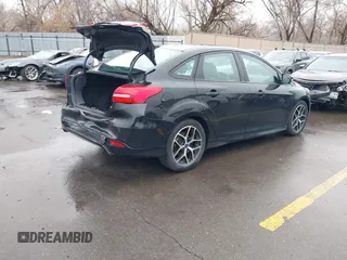 2015 Ford Focus SE with VIN 1FADP3F22FL240476, listed as a IAAI auction lot 41739722 with 159,179 mi miles. Bid and sale history available at carsss.com. Image 4.