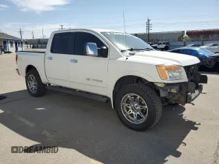 2011 Nissan Titan Pro-4X with VIN 1N6BA0EC2BN317628, listed as a Copart auction lot 52367505 with 178,601 mi miles and Salvage title. Bid and sale history available at DreamBid. Image 4.