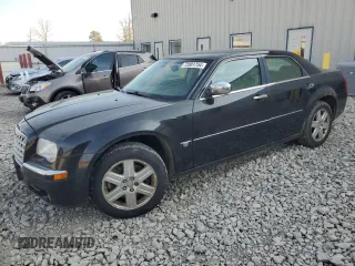 2006 Chrysler 300 C z VIN 2C3LK63H36H345091, wystawiony jako Copart lot #72001754 z przebiegiem 192 896 mil mil oraz Czysty tytuł • Clean title. Historia ofert i sprzedaży dostępna na DreamBid. Obrazek 1.