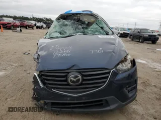 2016 Mazda CX-5 Grand Touring with VIN JM3KE4DY3G0797301, listed as a Copart auction lot 88356205 with Not Provided miles and Non Repairable. Bid and sale history available at carsss.com. Image 5.