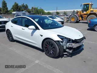 2022 Tesla Model 3 Performance with VIN 5YJ3E1ECXNF270238, listed as a IAAI auction lot 42173668 with 13,017 mi miles and . Bid and sale history available at DreamBid. Image 1.