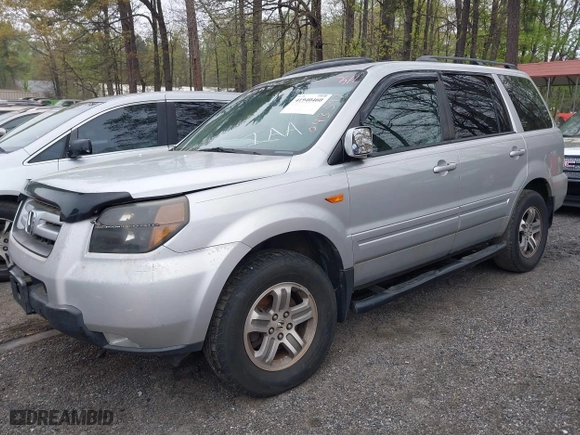 2006 Honda Pilot EX-L with RES with VIN 5FNYF286X6B043597, listed as a IAAI auction lot 41940460 with 325,118 mi miles. Bid and sale history available at carsss.com. Image 2.