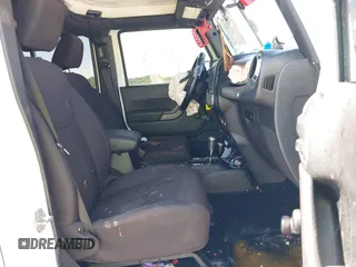 2013 Jeep Wrangler Unlimited Sport with VIN 1C4BJWDG4DL697208, listed as a IAAI auction lot 39507413 with 177,125 mi miles and . Bid and sale history available at DreamBid. Image 5.