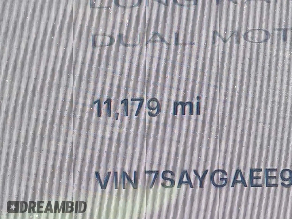 2023 Tesla Model Y Long Range with VIN 7SAYGAEE9PF905943, listed as a IAAI auction lot 41444255 with 11,179 mi miles and . Bid and sale history available at DreamBid. Image 14.