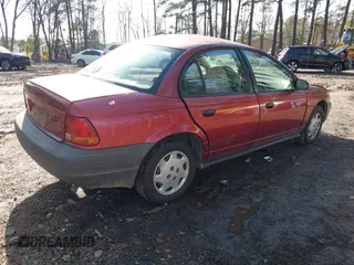 1997 Saturn SL with VIN 1G8ZF528XVZ325466, listed as a IAAI auction lot 41576703 with 237,089 mi miles. Bid and sale history available at carsss.com. Image 4.