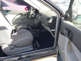 2005 Ford Focus S with VIN 3FAFP31NX5R130978, listed as a IAAI auction lot 41478955 with 217,380 mi miles and . Bid and sale history available at carsss.com. Image 5.