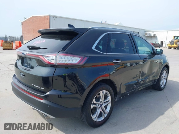 2015 Ford Edge Titanium z VIN 2FMTK3K87FBC06852, wystawiony jako IAAI lot #42335238 z przebiegiem 187 256 mil mil oraz . Historia ofert i sprzedaży dostępna na DreamBid. Obrazek 4.