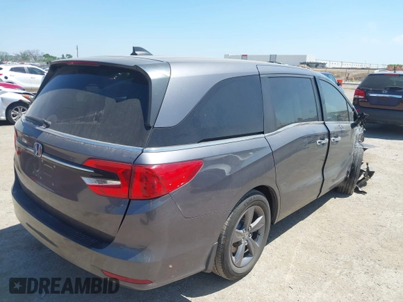 2021 Honda Odyssey EX z VIN 5FNRL6H58MB043929, wystawiony jako IAAI lot #42028687 z przebiegiem 59 668 mil mil oraz . Historia ofert i sprzedaży dostępna na DreamBid. Obrazek 4.