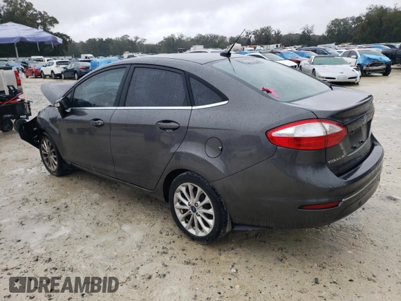 2017 Ford Fiesta Titanium with VIN 3FADP4CJ4HM123260, listed as a Copart auction lot 46355095 with 69,398 mi miles and Salvage Title. Bid and sale history available at carsss.com. Image 2.