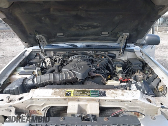 2004 Ford Explorer Sport Trac XLS z VIN 1FMZU77K94UA89637, wystawiony jako IAAI lot #42133712 z przebiegiem 174 293 mil mil oraz . Historia ofert i sprzedaży dostępna na DreamBid. Obrazek 10.