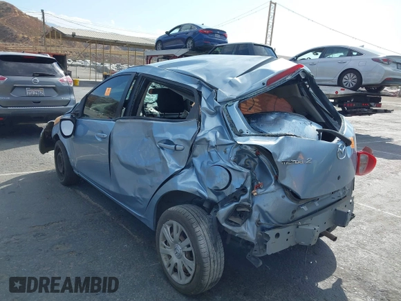 2013 Mazda 2 Sport z VIN JM1DE1KZ4D0163423, wystawiony jako IAAI lot #40404598 z przebiegiem Nie podano mil oraz . Historia ofert i sprzedaży dostępna na DreamBid. Obrazek 3.