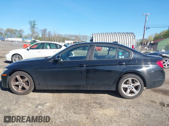 2015 BMW 3 Series 320i with VIN WBA3B1G55FNT04870, listed as a IAAI auction lot 42141211 with 249,720 mi miles. Bid and sale history available at carsss.com. Image 14.