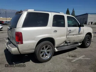 2003 Cadillac Escalade z VIN 1GYEK63NX3R256926, wystawiony jako Copart lot #52764695 z przebiegiem 195 641 mil mil oraz Szkoda całkowita • Salvage title. Historia ofert i sprzedaży dostępna na DreamBid. Obrazek 3.