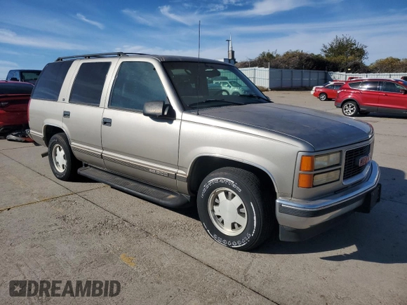 1999 GMC Yukon with VIN 1GKEC13R3XJ806033, listed as a Copart auction lot 80365934 with 154,984 mi miles and Clean Title. Bid and sale history available at carsss.com. Image 4.