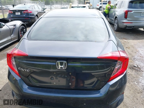 2016 Honda Civic Sedan EX with VIN 19XFC2F7XGE057647, listed as a IAAI auction lot 42016303 with 157,106 mi miles. Bid and sale history available at carsss.com. Image 16.