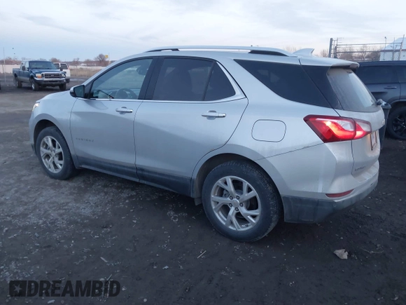 2019 Chevrolet Equinox Premier with VIN 2GNAXXEV1K6244691, listed as a IAAI auction lot 41164317 with 89,604 mi miles and . Bid and sale history available at DreamBid. Image 3.