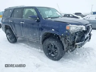 2014 Toyota 4Runner Limited with VIN JTEBU5JR3E5161309, listed as a IAAI auction lot 41560923 with 144,943 mi miles. Bid and sale history available at carsss.com. Image 1.