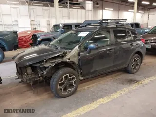 2015 Subaru XV Crosstrek Limited with VIN JF2GPASC8F8242439, listed as a IAAI auction lot 41787469 with 148,828 mi miles. Bid and sale history available at carsss.com. Image 2.