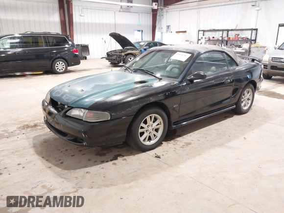 1998 Ford Mustang GT with VIN 1FAFP45X5WF249652, listed as a IAAI auction lot 41830267 with 210,192 mi miles. Bid and sale history available at carsss.com. Image 2.