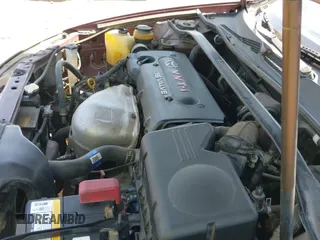 2002 Toyota Camry LE z VIN JTDBE32KX20132776, wystawiony jako IAAI lot #42732005 z przebiegiem 230 545 mil mil oraz . Historia ofert i sprzedaży dostępna na DreamBid. Obrazek 12.