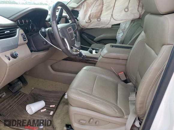 2016 GMC Yukon XL SLT z VIN 1GKS1GKC1GR252081, wystawiony jako Copart lot #53354975 z przebiegiem 200 621 mil mil oraz Szkoda całkowita • Salvage title. Historia ofert i sprzedaży dostępna na DreamBid. Obrazek 7.