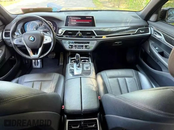 2019 BMW 7 Series 740i z VIN WBA7E2C59KB218XXX, wystawiony jako Copart lot #48633165 z przebiegiem 79 444 mil mil oraz Czysty tytuł • Clean title. Historia ofert i sprzedaży dostępna na DreamBid. Obrazek 7.