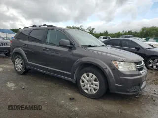 2016 Dodge Journey SE with VIN 3C4PDCAB1GT110587, listed as a Copart auction lot 56073675 with 186,044 mi miles and Clean Title. Bid and sale history available at DreamBid. Image 4.