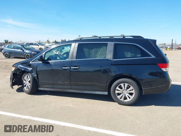 2015 Honda Odyssey EX-L with VIN 5FNRL5H68FB079528, listed as a IAAI auction lot 41893783 with 90,371 mi miles and . Bid and sale history available at DreamBid. Image 14.