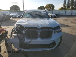 2022 BMW X4 M z VIN 5YM23EC00N9L35827, wystawiony jako Copart lot #87932635 z przebiegiem Nie podano mil oraz Szkoda całkowita • Salvage title. Historia ofert i sprzedaży dostępna na DreamBid. Obrazek 5.