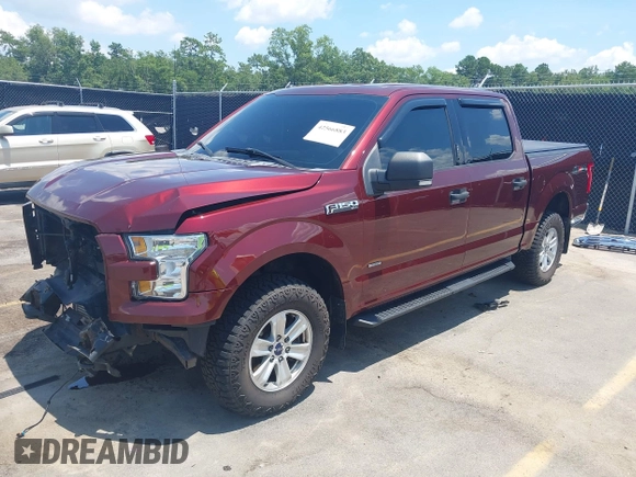 2015 Ford F-150 XLT with VIN 1FTEW1EG4FFC63243, listed as a IAAI auction lot 42566883 with 101,547 mi miles and . Bid and sale history available at DreamBid. Image 2.