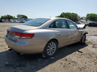 2006 Hyundai Azera SE with VIN KMHFC46F46A034316, listed as a Copart auction lot 61857655 with 203,011 mi miles and Salvage title. Bid and sale history available at DreamBid. Image 3.