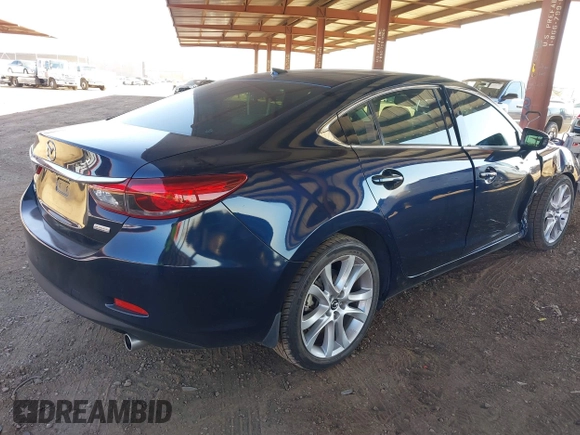 2016 Mazda 6 i Touring with VIN JM1GJ1T5XG1434388, listed as a IAAI auction lot 41528124 with 99,293 mi miles and . Bid and sale history available at DreamBid. Image 4.