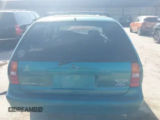 1997 Ford Escort LX z VIN 3FALP15P7VR158272, wystawiony jako IAAI lot #41833216 z przebiegiem 148 170 mil mil oraz . Historia ofert i sprzedaży dostępna na DreamBid. Obrazek 15.