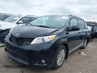 2016 Toyota Sienna XLE with VIN 5TDYK3DC8GS718289, listed as a IAAI auction lot 41774375 with 154,067 mi miles. Bid and sale history available at carsss.com. Image 20.