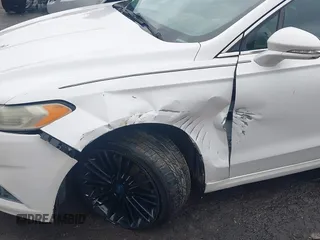 2013 Ford Fusion SE with VIN 3FA6P0HR5DR246577, listed as a IAAI auction lot 40777607 with 224,994 mi miles. Bid and sale history available at carsss.com. Image 6.