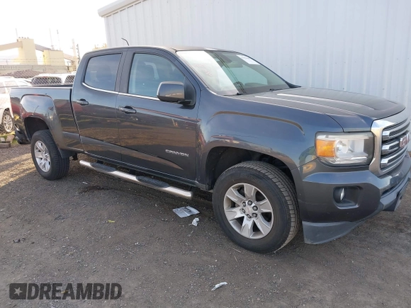 2015 GMC Canyon 2WD SLE with VIN 1GTG5BE35F1120622, listed as a IAAI auction lot 41421685 with 132,224 mi miles. Bid and sale history available at carsss.com. Image 1.