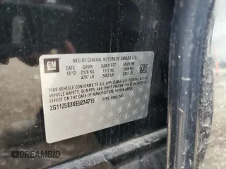 2014 Chevrolet Impala LT z VIN 2G1125S3XE9234719, wystawiony jako Copart lot #58139885 z przebiegiem 120 561 mil mil oraz Szkoda całkowita • Salvage title. Historia ofert i sprzedaży dostępna na DreamBid. Obrazek 13.