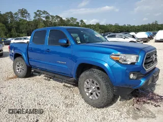 2017 Toyota Tacoma SR5 with VIN 5TFAZ5CN4HX051289, listed as a Copart auction lot 54206125 with 98,429 mi miles and Salvage Title. Bid and sale history available at DreamBid. Image 4.