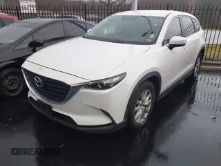 2016 Mazda CX-9 Sport with VIN JM3TCABY4G0123931, listed as a IAAI auction lot 41710045 with 161,109 mi miles. Bid and sale history available at carsss.com. Image 1.