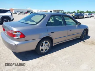 2000 Honda Accord EX z VIN JHMCG5656YC033893, wystawiony jako IAAI lot #42305487 z przebiegiem 224 625 mil mil oraz . Historia ofert i sprzedaży dostępna na DreamBid. Obrazek 4.