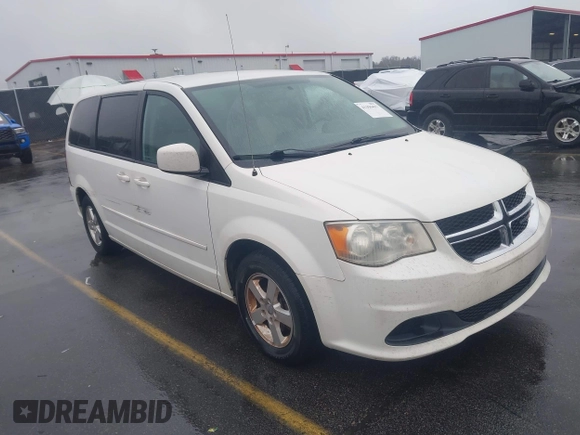 2012 Dodge Grand Caravan SXT with VIN 2C4RDGCG4CR304472, listed as a IAAI auction lot 41396437 with 180,309 mi miles and . Bid and sale history available at DreamBid. Image 1.