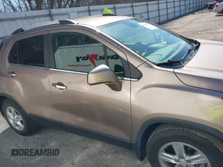 2018 Chevrolet Trax LT with VIN 3GNCJLSB8JL207404, listed as a IAAI auction lot 41796517 with 124,439 mi miles. Bid and sale history available at carsss.com. Image 13.