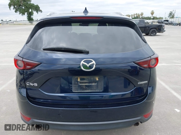 2020 Mazda CX-5 Touring with VIN JM3KFACM2L0856777, listed as a IAAI auction lot 42073972 with 151,628 mi miles. Bid and sale history available at carsss.com. Image 17.