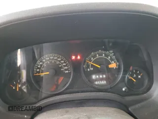 2015 Jeep Patriot North with VIN 1C4NJRAB7FD311725, listed as a Copart auction lot 82647074 with 185,560 mi miles and Salvage Title. Bid and sale history available at carsss.com. Image 9.