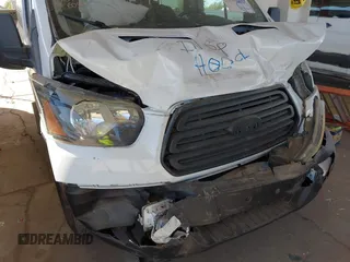 2016 Ford Transit XL with VIN 1FMZK1YM4GKA56094, listed as a IAAI auction lot 40458219 with Not provided miles and . Bid and sale history available at DreamBid. Image 6.