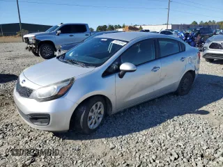 2014 Kia Rio LX with VIN KNADM4A32E6402156, listed as a Copart auction lot 79131234 with 152,689 mi miles and Salvage Title. Bid and sale history available at carsss.com. Image 1.