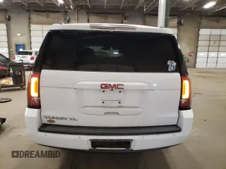 2015 GMC Yukon XL SLT z VIN 1GKS2HKC4FR545409, wystawiony jako Copart lot #55401425 z przebiegiem 214 848 mil mil oraz Czysty tytuł • Clean title. Historia ofert i sprzedaży dostępna na DreamBid. Obrazek 6.